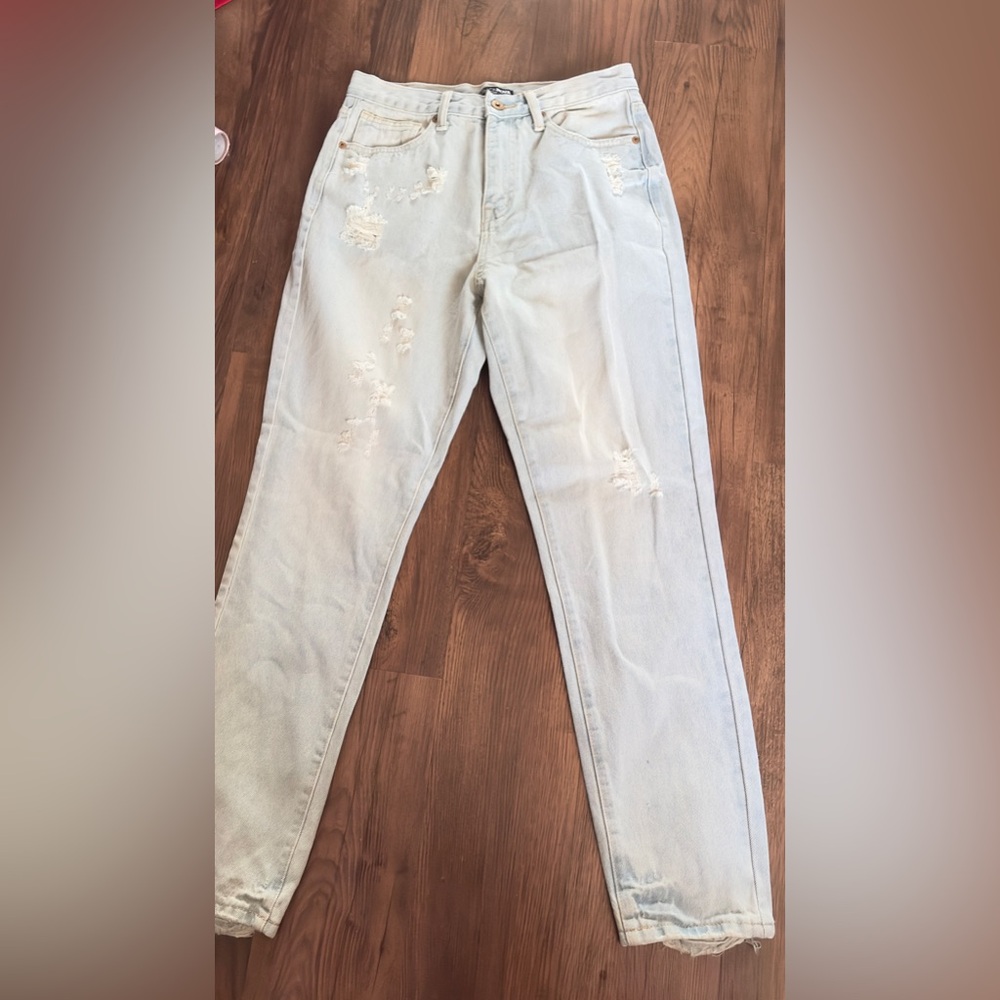 Fashion nova Light Blue Distressed women’s jeans - size 5/27 (small)